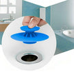 Bouchon Bigbon bleu posé au-dessus du trou d'un lavabo